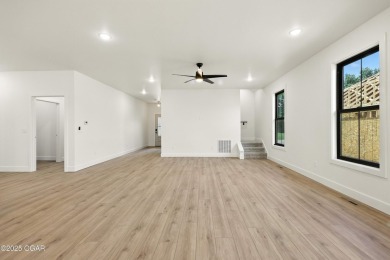 Welcome to 4402 Par Ln, a beautifully designed new construction on Twin Hills Golf and Country Club in Missouri - for sale on GolfHomes.com, golf home, golf lot