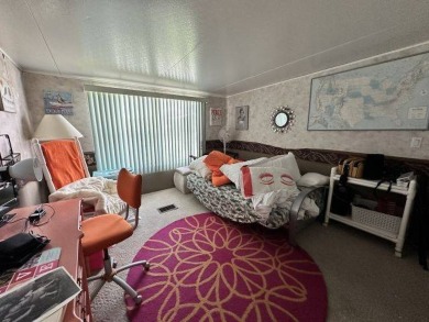 MOTIVATED SELLER ~ NEW REDUCED PRICE! Nestled on the Chain of on Four Lakes Golf Club in Florida - for sale on GolfHomes.com, golf home, golf lot