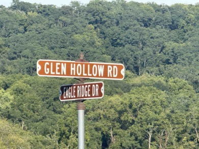 Upsloping, wooded lot on Glen Hollow, just east of Creekwood on Eagle Ridge Inn and Resort in Illinois - for sale on GolfHomes.com, golf home, golf lot