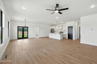 Welcome to 4308 Par Ln, a beautifully designed new construction on Twin Hills Golf and Country Club in Missouri - for sale on GolfHomes.com, golf home, golf lot