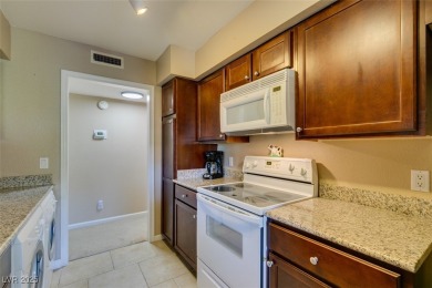 Stunning Guard-Gated 1st Floor Condo with 7th Fairway Golf on Las Vegas Country Club in Nevada - for sale on GolfHomes.com, golf home, golf lot