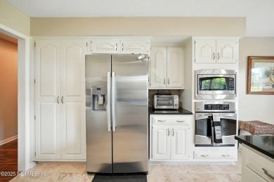 Rare Opportunity in Eastpointe of Hidden Hills! This beautifully on Hidden Hills Country Club in Florida - for sale on GolfHomes.com, golf home, golf lot