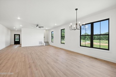Welcome to 4308 Par Ln, a beautifully designed new construction on Twin Hills Golf and Country Club in Missouri - for sale on GolfHomes.com, golf home, golf lot