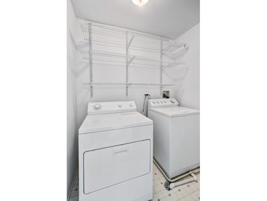 Nestled within the Fairway Club, this exceptional end unit on Edgewood Valley Country Club in Illinois - for sale on GolfHomes.com, golf home, golf lot