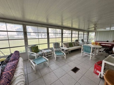MOTIVATED SELLER ~ NEW REDUCED PRICE! Nestled on the Chain of on Four Lakes Golf Club in Florida - for sale on GolfHomes.com, golf home, golf lot