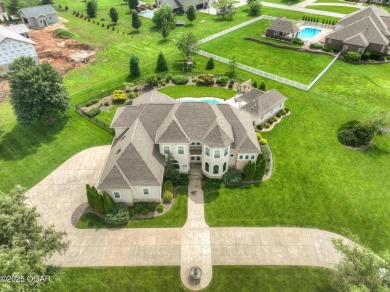 Don't miss your chance to own this stunning 5,600 sq ft estate on Carthage Municipal Golf Course in Missouri - for sale on GolfHomes.com, golf home, golf lot