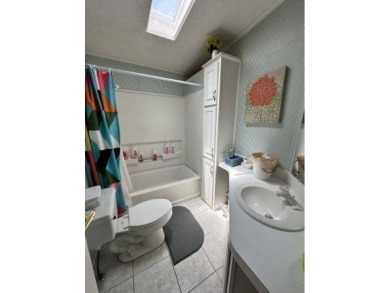 MOTIVATED SELLER ~ NEW REDUCED PRICE! Nestled on the Chain of on Four Lakes Golf Club in Florida - for sale on GolfHomes.com, golf home, golf lot