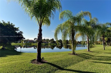 Impeccably maintained lakefront home in the coveted golf course on Keys Gate Golf Club in Florida - for sale on GolfHomes.com, golf home, golf lot