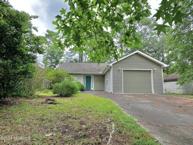 Inviting 2 bedroom/2bath home in the heart of Calabash, NC! Open on Carolina Shores Golf Course in North Carolina - for sale on GolfHomes.com, golf home, golf lot