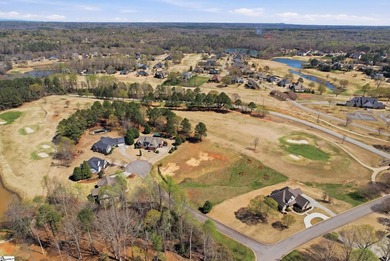 Build your dream home on this beautiful vacant lot tucked away on Woodfin Ridge Golf Club in South Carolina - for sale on GolfHomes.com, golf home, golf lot