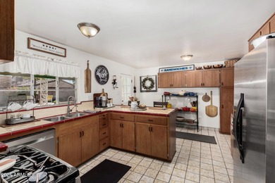 Welcome to this sprawling mid-century ranch home in the beloved on Encanto 18 Golf Course in Arizona - for sale on GolfHomes.com, golf home, golf lot