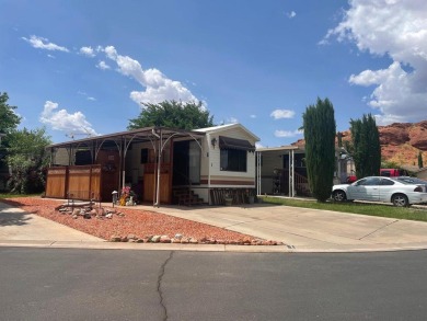 This darling Park Model Home is very clean, has a washer/dryer on Green Spring Country Club in Utah - for sale on GolfHomes.com, golf home, golf lot