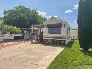 This darling Park Model Home is very clean, has a washer/dryer on Green Spring Country Club in Utah - for sale on GolfHomes.com, golf home, golf lot
