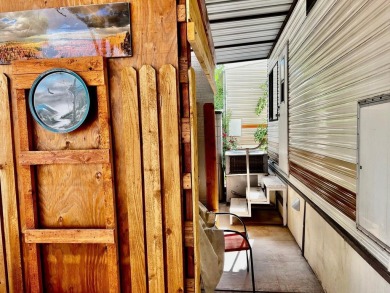 This darling Park Model Home is very clean, has a washer/dryer on Green Spring Country Club in Utah - for sale on GolfHomes.com, golf home, golf lot