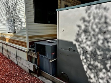 This darling Park Model Home is very clean, has a washer/dryer on Green Spring Country Club in Utah - for sale on GolfHomes.com, golf home, golf lot