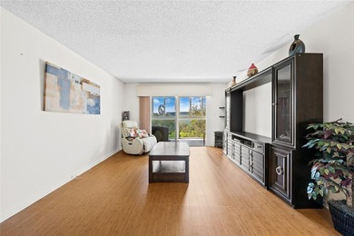 Spacious 2-bedroom, 2-bathroom top-floor condo overlooking a on  in Florida - for sale on GolfHomes.com, golf home, golf lot