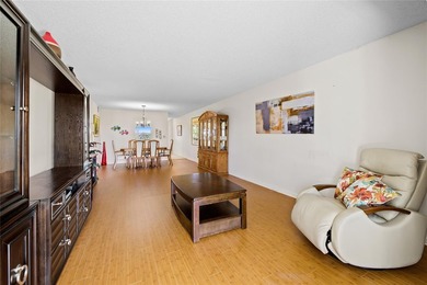 Spacious 2-bedroom, 2-bathroom top-floor condo overlooking a on  in Florida - for sale on GolfHomes.com, golf home, golf lot