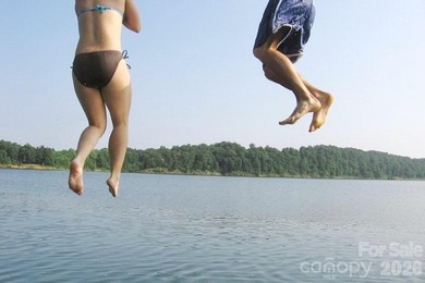 Lot 3005 is .70 acres. Welcome to Tillery Tradition Country Club on The Tillery Tradition Country Club in North Carolina - for sale on GolfHomes.com, golf home, golf lot