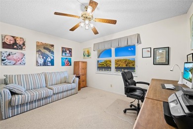 Spacious 2-bedroom, 2-bathroom top-floor condo overlooking a on  in Florida - for sale on GolfHomes.com, golf home, golf lot