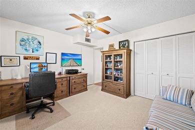 Spacious 2-bedroom, 2-bathroom top-floor condo overlooking a on  in Florida - for sale on GolfHomes.com, golf home, golf lot