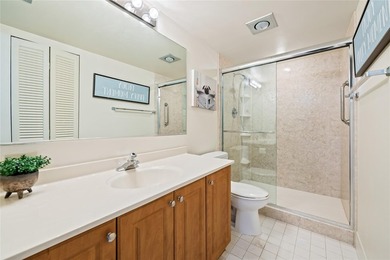 Spacious 2-bedroom, 2-bathroom top-floor condo overlooking a on  in Florida - for sale on GolfHomes.com, golf home, golf lot