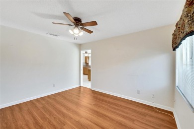 Under contract-accepting backup offers. This remarkable Islander on Sandpiper Golf Club in Florida - for sale on GolfHomes.com, golf home, golf lot