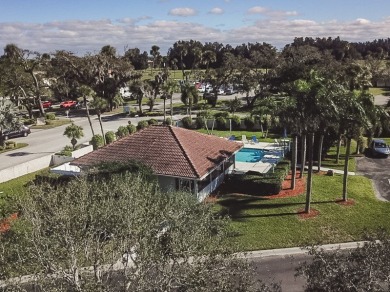 All age community. 2nd floor unit with pond water views. New AC on The American Golf Club in Florida - for sale on GolfHomes.com, golf home, golf lot