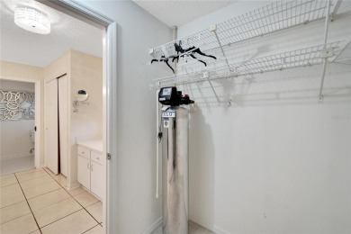 Under contract-accepting backup offers. This remarkable Islander on Sandpiper Golf Club in Florida - for sale on GolfHomes.com, golf home, golf lot