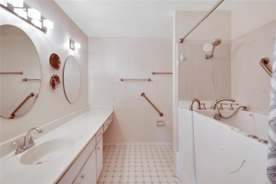 Under contract-accepting backup offers. This remarkable Islander on Sandpiper Golf Club in Florida - for sale on GolfHomes.com, golf home, golf lot
