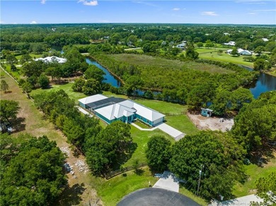 Every day is a vacation in this custom CBS 4 bedroom, 4.5 bath on The Cape Club of Palm City in Florida - for sale on GolfHomes.com, golf home, golf lot