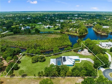 Every day is a vacation in this custom CBS 4 bedroom, 4.5 bath on The Cape Club of Palm City in Florida - for sale on GolfHomes.com, golf home, golf lot