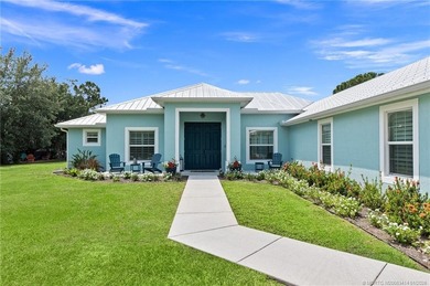 Every day is a vacation in this custom CBS 4 bedroom, 4.5 bath on The Cape Club of Palm City in Florida - for sale on GolfHomes.com, golf home, golf lot