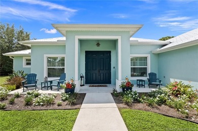 Every day is a vacation in this custom CBS 4 bedroom, 4.5 bath on The Cape Club of Palm City in Florida - for sale on GolfHomes.com, golf home, golf lot