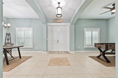 Every day is a vacation in this custom CBS 4 bedroom, 4.5 bath on The Cape Club of Palm City in Florida - for sale on GolfHomes.com, golf home, golf lot