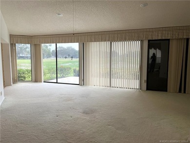 Needs TLC...the future buyer will remodel this home and at this on Martin Downs Country Club in Florida - for sale on GolfHomes.com, golf home, golf lot