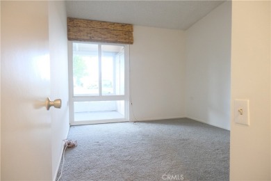 Mutual 1-69K is a lovely west facing unit with an adorable on Leisure World Seal Beach Golf Course in California - for sale on GolfHomes.com, golf home, golf lot