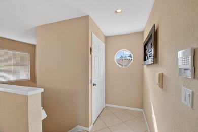 Spacious 2,094 sq ft upstairs coach home with Vaulted ceilings on  in Florida - for sale on GolfHomes.com, golf home, golf lot