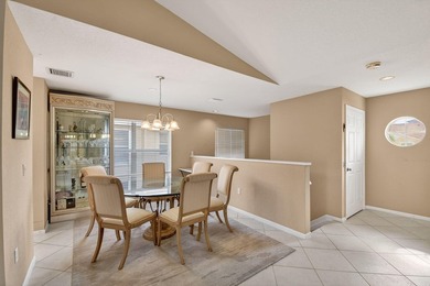 Spacious 2,094 sq ft upstairs coach home with Vaulted ceilings on  in Florida - for sale on GolfHomes.com, golf home, golf lot