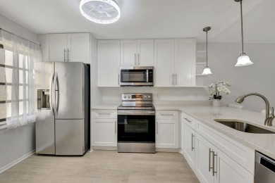 Enjoy this light-filled, Fully remodeled 2 bed/2-bath/2nd Fl on Boca Lago Golf and Country Club in Florida - for sale on GolfHomes.com, golf home, golf lot