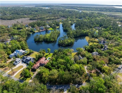 This remarkable lakefront lot spans just under one acre (0.90) on The King and Prince Golf Course, Home of the Hampton Club in Georgia - for sale on GolfHomes.com, golf home, golf lot