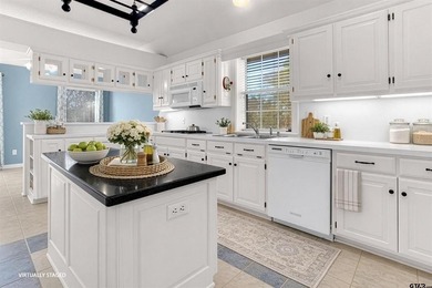 Welcome to 532 Dogwood Lane in the gated Hideaway Lake on Hide-A-Way Lake Golf Course in Texas - for sale on GolfHomes.com, golf home, golf lot