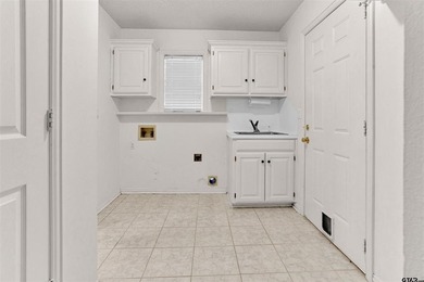 Welcome to 532 Dogwood Lane in the gated Hideaway Lake on Hide-A-Way Lake Golf Course in Texas - for sale on GolfHomes.com, golf home, golf lot