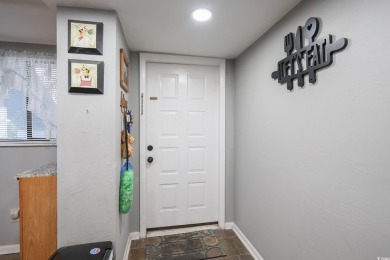 Welcome to 1301 Pidgen Rd Unit 1101, a beautiful first-floor end on Whispering Pines in South Carolina - for sale on GolfHomes.com, golf home, golf lot