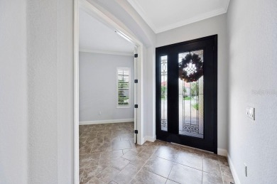 Gated in Beautiful Laurel Glen at Grasslands sits the *Wyndham* on Grasslands Golf and Country Club in Florida - for sale on GolfHomes.com, golf home, golf lot