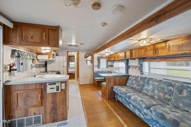 START LIVING THE LAKE LIFE NOW!! WATERFRONT GET-AWAY WITH 75 FT on River Golf and Country Club at Lake Royale in North Carolina - for sale on GolfHomes.com, golf home, golf lot