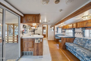 START LIVING THE LAKE LIFE NOW!! WATERFRONT GET-AWAY WITH 75 FT on River Golf and Country Club at Lake Royale in North Carolina - for sale on GolfHomes.com, golf home, golf lot