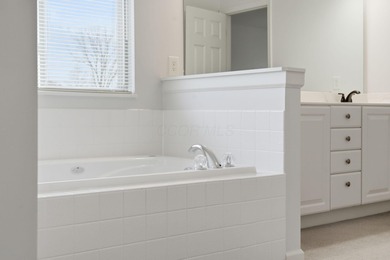 Welcome to this spacious five-level split home perfectly on Scioto Reserve Golf and Athletic Club in Ohio - for sale on GolfHomes.com, golf home, golf lot