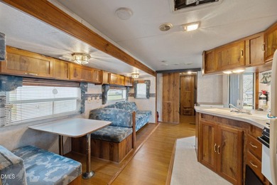 START LIVING THE LAKE LIFE NOW!! WATERFRONT GET-AWAY WITH 75 FT on River Golf and Country Club at Lake Royale in North Carolina - for sale on GolfHomes.com, golf home, golf lot