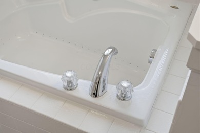 Welcome to this spacious five-level split home perfectly on Scioto Reserve Golf and Athletic Club in Ohio - for sale on GolfHomes.com, golf home, golf lot