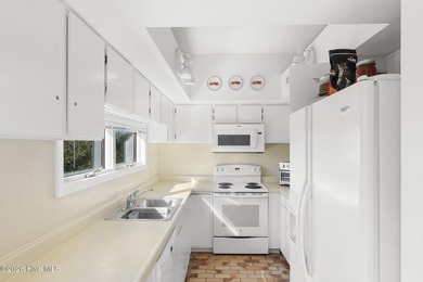 Oceanview condo nestled within the maritime forest, offering on The Country Club of the Crystal Coast in North Carolina - for sale on GolfHomes.com, golf home, golf lot